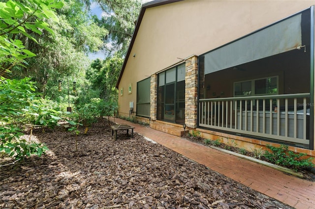 552 NW 136th St, Newberry, FL 32669 - view of home's exterior featuring stucco siding