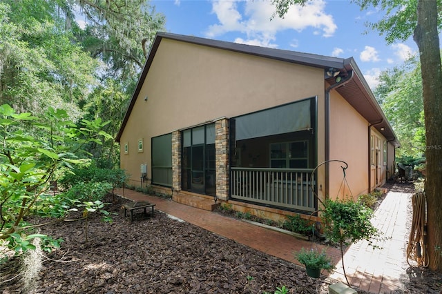 552 NW 136th St, Newberry, FL 32669 - view of side of property featuring stucco siding