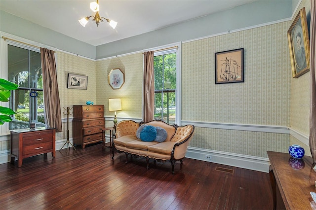 708 E University Ave, Gainesville, FL 32601 - sitting room featuring wallpapered walls and hardwood / wood-style flooring
