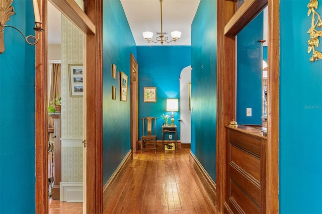 708 E University Ave, Gainesville, FL 32601 - entrance foyer featuring wood-type flooring and a chandelier