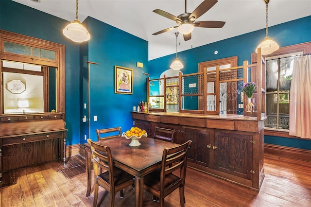 708 E University Ave, Gainesville, FL 32601 - dining area with ceiling fan and hardwood / wood-style flooring