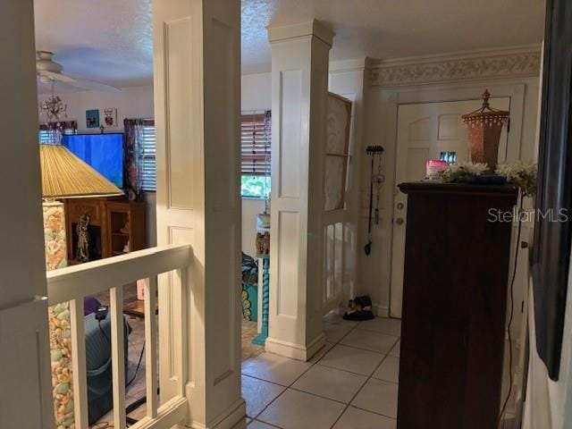 8411 N Pine Needle Ter, Crystal River, FL 34428 - hall featuring light tile patterned floors and ornate columns