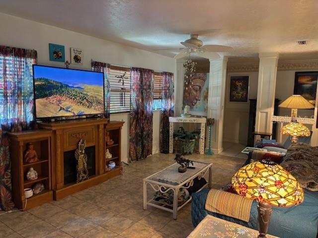8411 N Pine Needle Ter, Crystal River, FL 34428 - living room with a ceiling fan