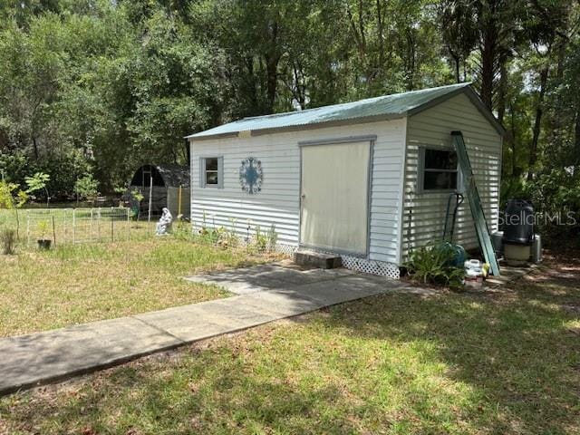 8411 N Pine Needle Ter, Crystal River, FL 34428 - view of shed with view of scattered trees