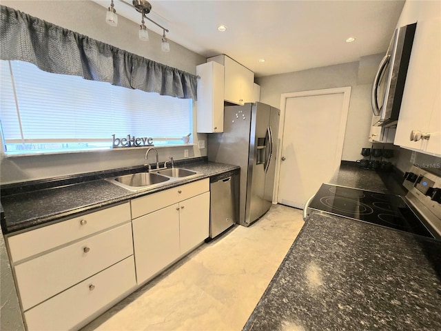 4110 NW 44th Dr Unit 0, Gainesville, FL 32606 - kitchen with appliances with stainless steel finishes, white cabinetry, and recessed lighting