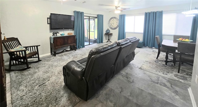 4110 NW 44th Dr Unit 0, Gainesville, FL 32606 - living room with ceiling fan and baseboards