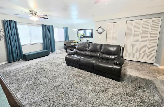 4110 NW 44th Dr Unit 0, Gainesville, FL 32606 - living area featuring a ceiling fan and carpet