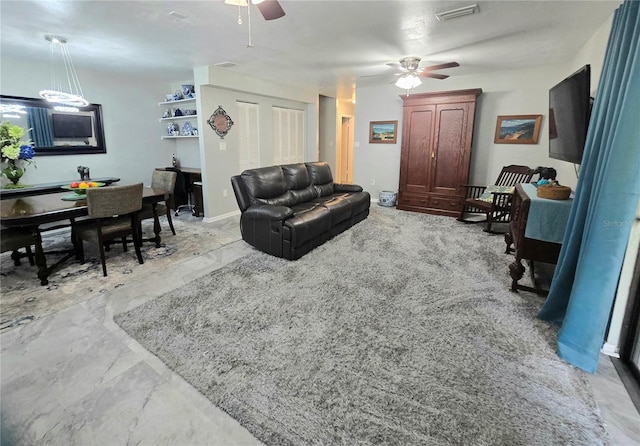 4110 NW 44th Dr Unit 0, Gainesville, FL 32606 - living room featuring a ceiling fan and light marble finish floors