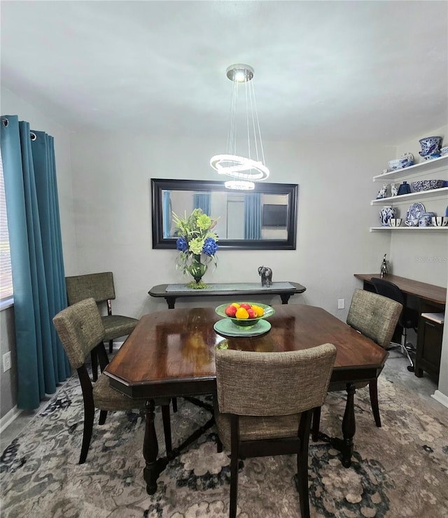 4110 NW 44th Dr Unit 0, Gainesville, FL 32606 - dining space with a chandelier
