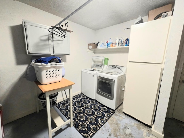 4110 NW 44th Dr Unit 0, Gainesville, FL 32606 - laundry room with washing machine and dryer and a textured ceiling