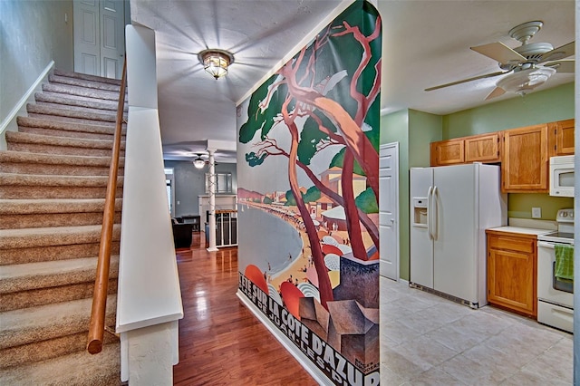 832 NW 42nd Ter, Gainesville, FL 32605 - staircase featuring ceiling fan