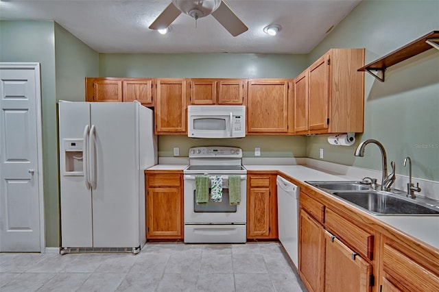 832 NW 42nd Ter, Gainesville, FL 32605 - kitchen with white appliances, a ceiling fan, light countertops, and light tile patterned flooring