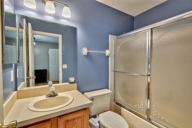832 NW 42nd Ter, Gainesville, FL 32605 - full bathroom featuring enclosed tub / shower combo, vanity, and ceiling fan
