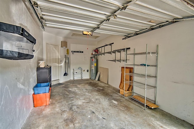 832 NW 42nd Ter, Gainesville, FL 32605 - garage with electric water heater and a garage door opener