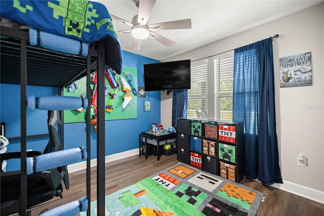 15591 NE 14th Pl, Williston, FL 32696 - bedroom with wood finished floors and a ceiling fan