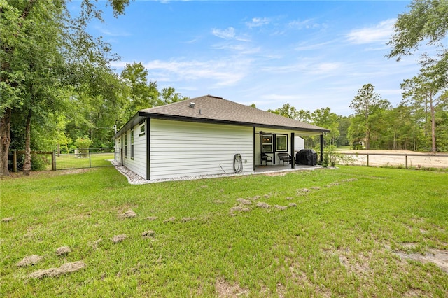 15591 NE 14th Pl, Williston, FL 32696 - rear view of property with a patio area