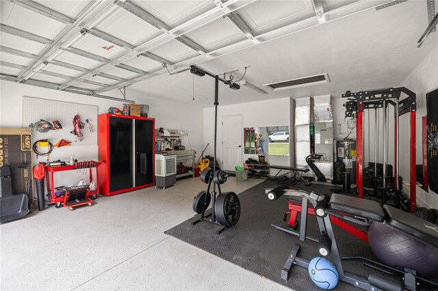 15591 NE 14th Pl, Williston, FL 32696 - exercise room featuring a garage