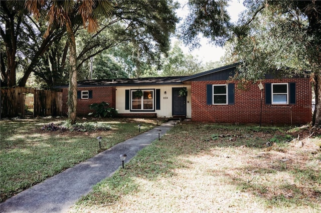 9835 NW 6th Pl, Gainesville, FL 32607 - single story home with brick siding
