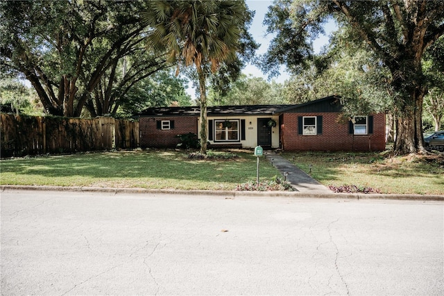 9835 NW 6th Pl, Gainesville, FL 32607 - single story home featuring brick siding