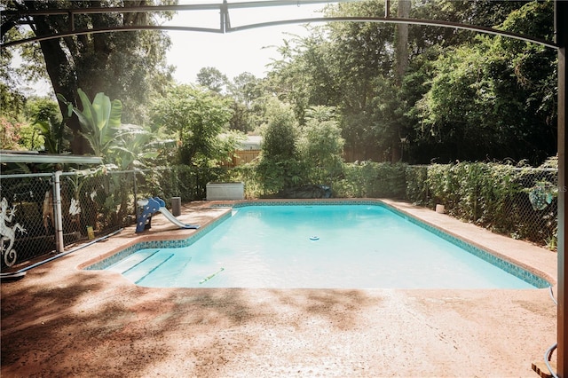 9835 NW 6th Pl, Gainesville, FL 32607 - view of swimming pool with a fenced backyard and a patio area