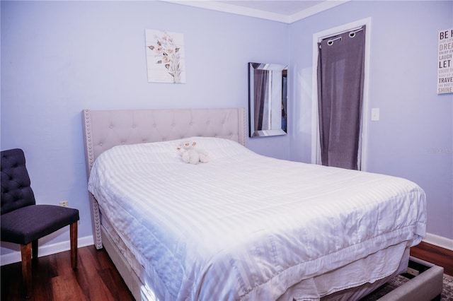 9835 NW 6th Pl, Gainesville, FL 32607 - bedroom with wood finished floors and crown molding