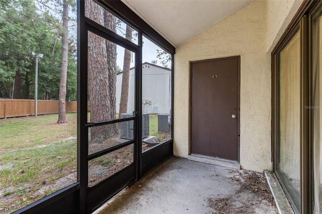 2635 SW 35th Pl Unit 304, Gainesville, FL 32608 - unfurnished sunroom with lofted ceiling