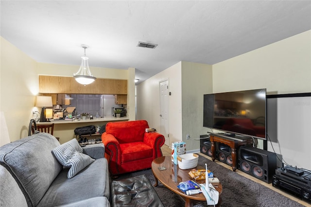 2635 SW 35th Pl Unit 304, Gainesville, FL 32608 - living room featuring carpet floors