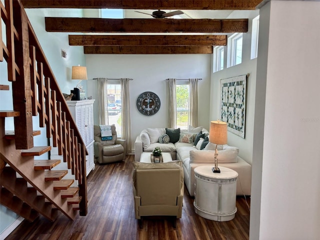 1536 S Central Ave, Flagler Beach, FL 32136 - living area with dark wood finished floors, beamed ceiling, ceiling fan, stairs, and a high ceiling