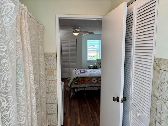 1536 S Central Ave, Flagler Beach, FL 32136 - hallway featuring wood finished floors and tile walls