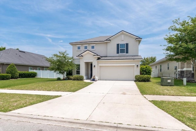 1011 Wetland Ridge Cir, Middleburg, FL 32068 - traditional-style home featuring stucco siding, concrete driveway, and a garage