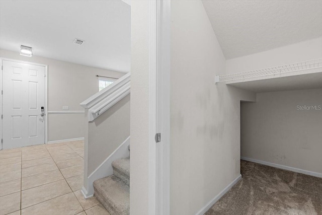 1011 Wetland Ridge Cir, Middleburg, FL 32068 - stairway featuring baseboards