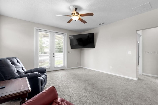 1011 Wetland Ridge Cir, Middleburg, FL 32068 - living area featuring ceiling fan, carpet flooring, and a textured ceiling
