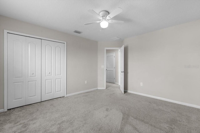 1011 Wetland Ridge Cir, Middleburg, FL 32068 - unfurnished bedroom featuring carpet floors, a closet, and ceiling fan