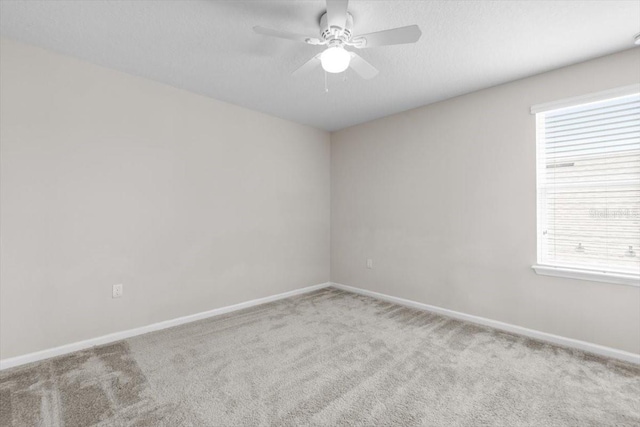 1011 Wetland Ridge Cir, Middleburg, FL 32068 - empty room featuring carpet floors, a ceiling fan, and plenty of natural light