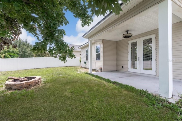 1011 Wetland Ridge Cir, Middleburg, FL 32068 - view of yard featuring a patio area, french doors, and a fire pit