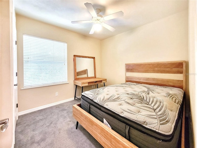 1220 SW 1st Ave Unit 304, Gainesville, FL 32601 - carpeted bedroom featuring baseboards and a ceiling fan