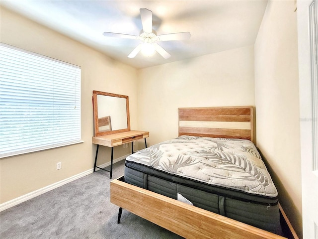 1220 SW 1st Ave Unit 304, Gainesville, FL 32601 - carpeted bedroom with baseboards and a ceiling fan