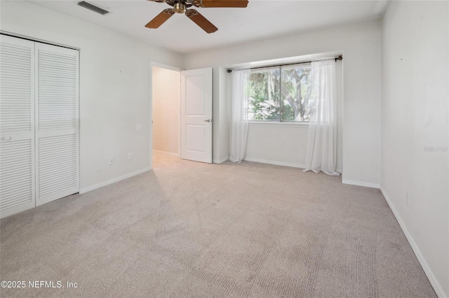 110 Cypress St, Hawthorne, FL 32640 - unfurnished bedroom featuring carpet floors, a closet, and ceiling fan