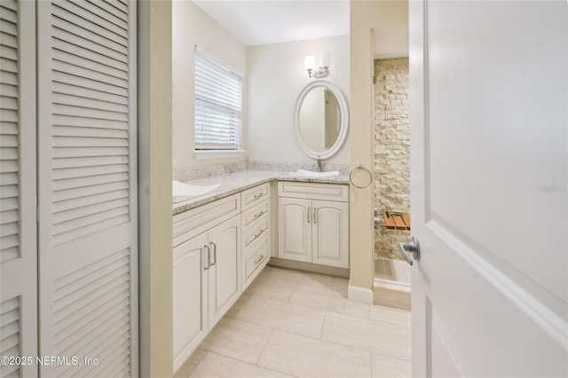 110 Cypress St, Hawthorne, FL 32640 - full bath with vanity, tile patterned flooring, and a closet