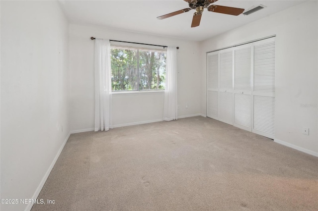 110 Cypress St, Hawthorne, FL 32640 - unfurnished bedroom featuring carpet flooring, a closet, and ceiling fan