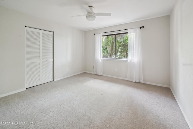 110 Cypress St, Hawthorne, FL 32640 - unfurnished bedroom featuring carpet, a closet, and ceiling fan