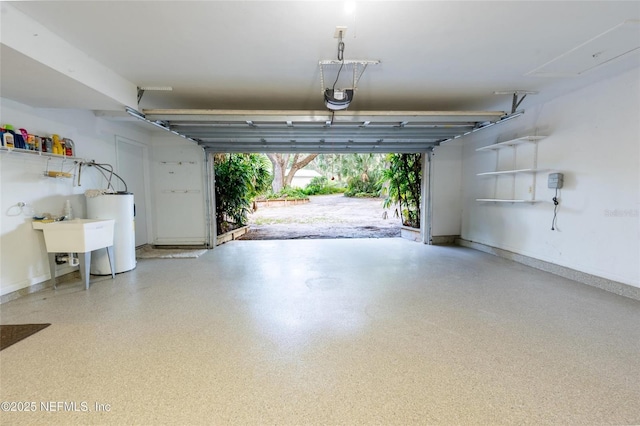 110 Cypress St, Hawthorne, FL 32640 - garage featuring water heater and a garage door opener