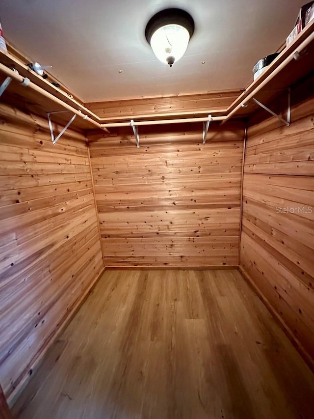 9947 SW 37th St, Lake Butler, FL 32054 - walk in closet featuring wood finished floors