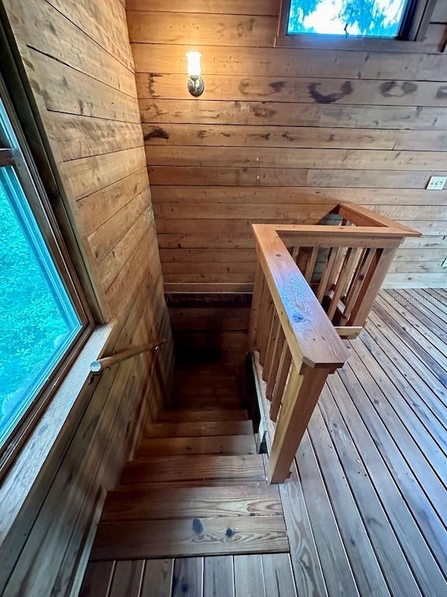 9947 SW 37th St, Lake Butler, FL 32054 - stairs with a sauna / steam room, wood walls, and hardwood / wood-style floors