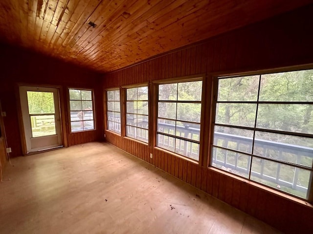 9947 SW 37th St, Lake Butler, FL 32054 - unfurnished sunroom featuring lofted ceiling, wooden ceiling, and wood walls