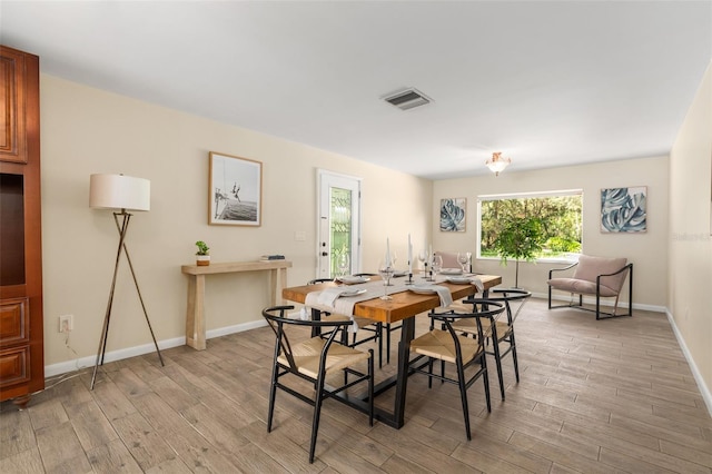 900 NW Snug Harbor Rd, Crystal River, FL 34428 - dining room with light wood-style floors
