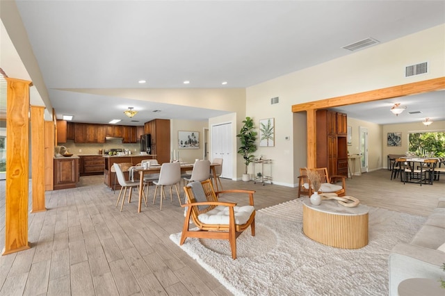 900 NW Snug Harbor Rd, Crystal River, FL 34428 - living room featuring light wood finished floors, recessed lighting, and high vaulted ceiling