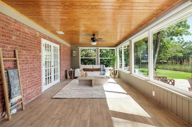 900 NW Snug Harbor Rd, Crystal River, FL 34428 - unfurnished sunroom with french doors, plenty of natural light, and ceiling fan