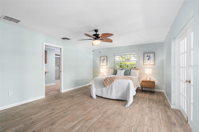 900 NW Snug Harbor Rd, Crystal River, FL 34428 - bedroom featuring light wood-type flooring and ceiling fan