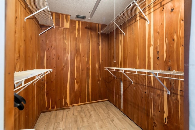 900 NW Snug Harbor Rd, Crystal River, FL 34428 - spacious closet featuring light wood-style floors